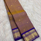Mustard gold Kanjivaram silk saree with royal violet Korvai border, full saree view