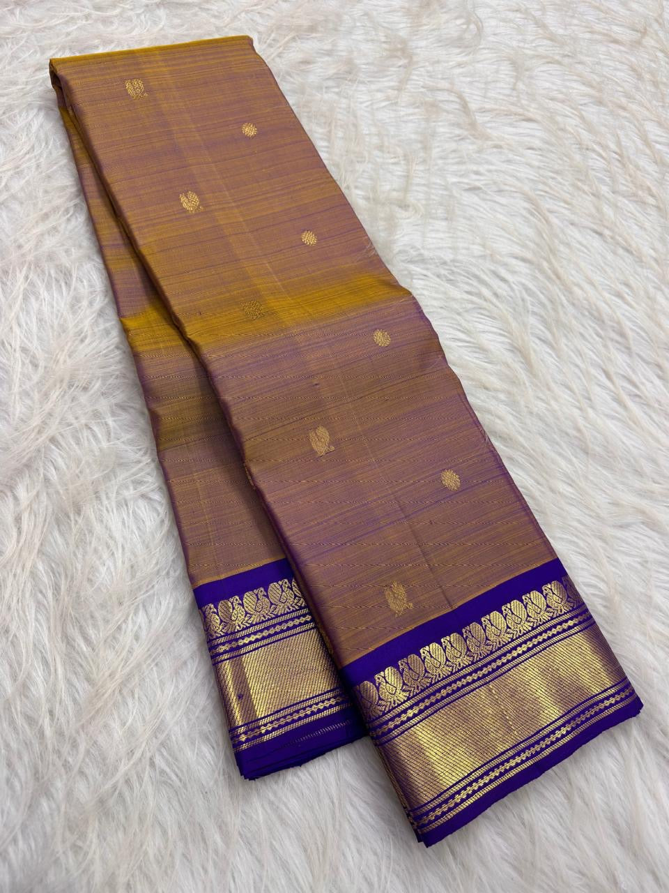 Mustard gold Kanjivaram silk saree with royal violet Korvai border, full saree view