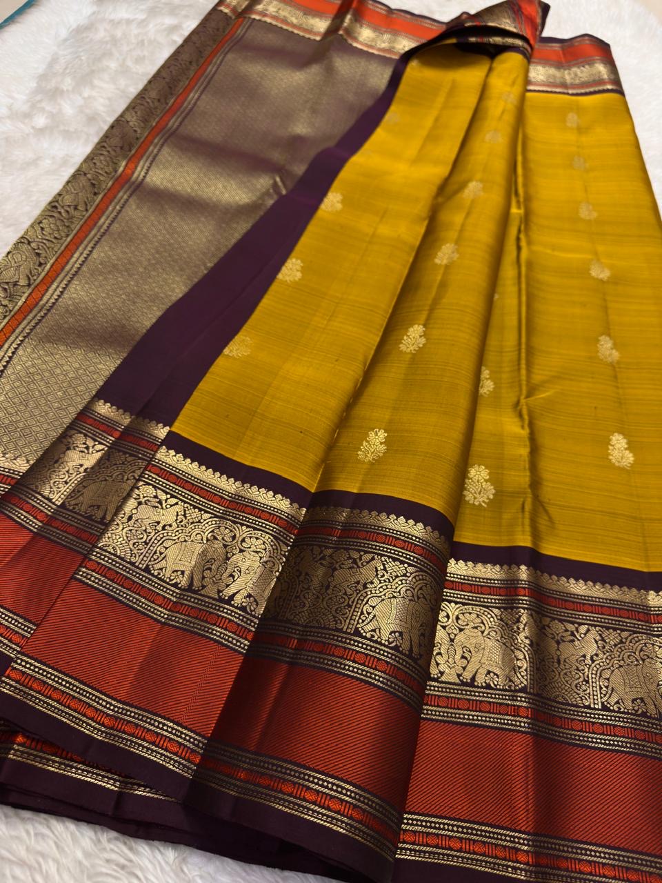Mustard Handwoven Pure Silk Kanchipuram Saree with Varisaipet Vanasringaram Border