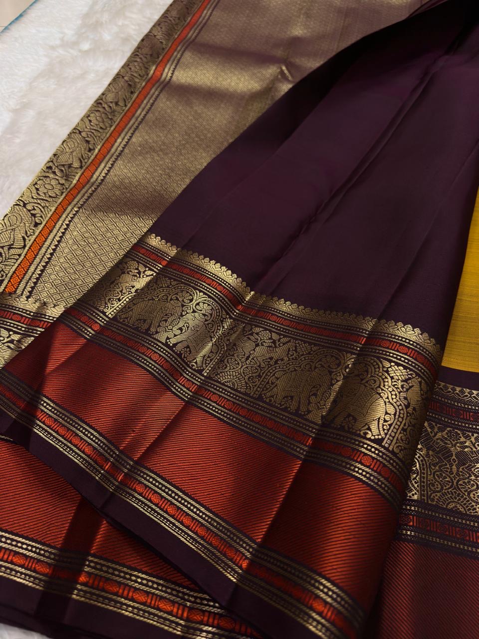 Mustard Handwoven Pure Silk Kanchipuram Saree with Varisaipet Vanasringaram Border