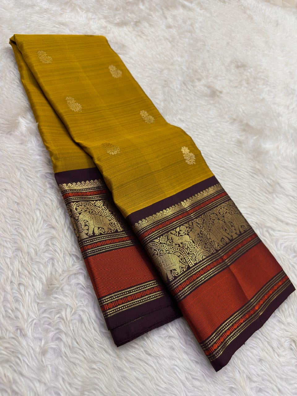 Mustard Handwoven Pure Silk Kanchipuram Saree with Varisaipet Vanasringaram Border