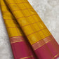 Mustard Yellow pure silk Kanchipuram saree — checked