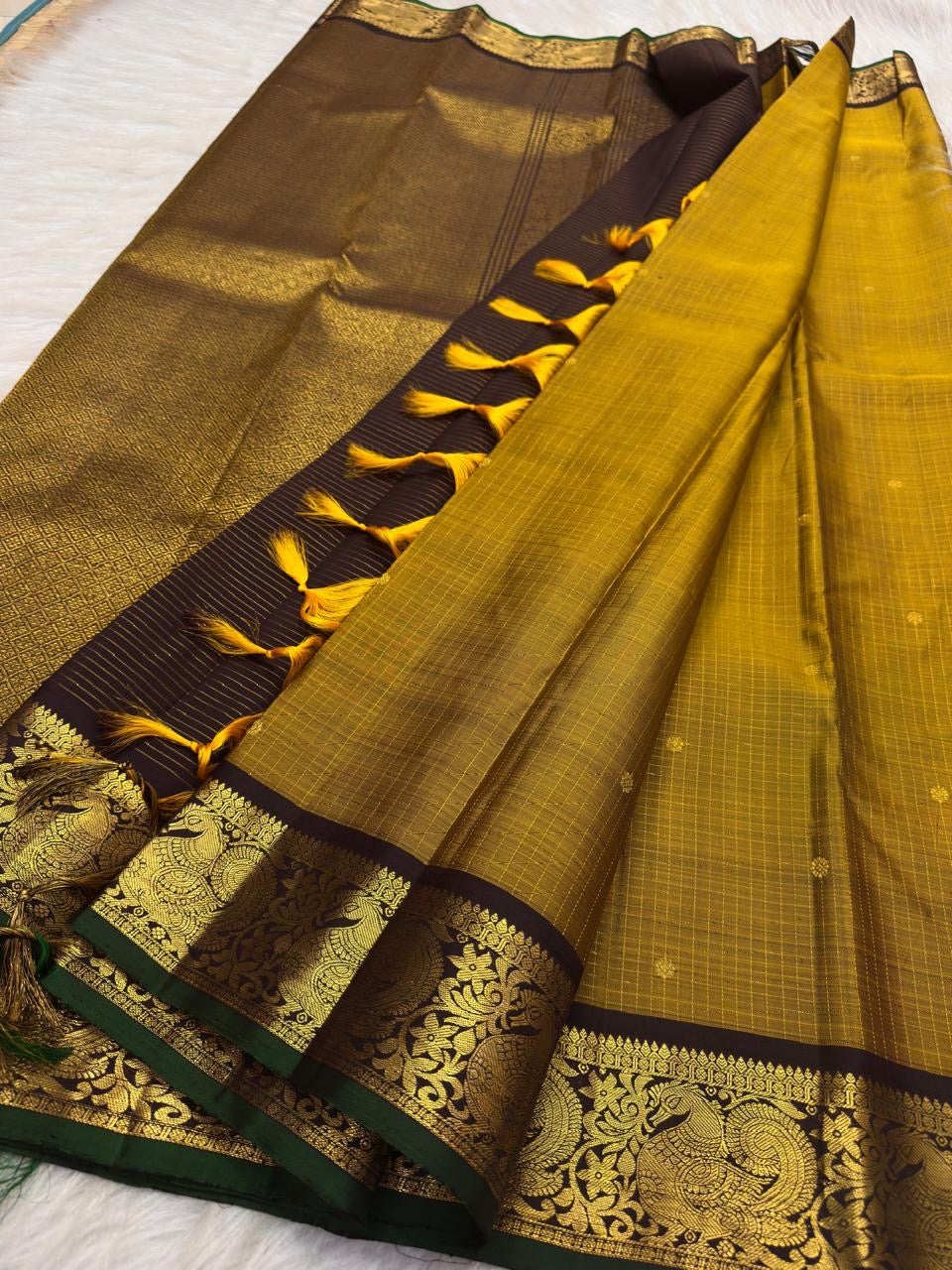 Mustard Yellow Handwoven Pure Silk Kanjivaram Zari Kattam Saree with Coffee Brown Peacock Border – silk fabric close-up