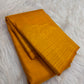 Canary Yellow Kanjeevaram silk saree body close-up with gold zari floral butta motifs