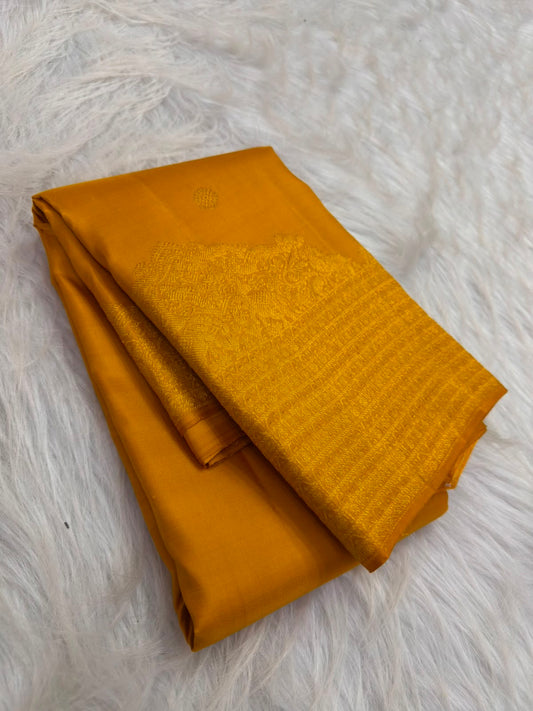 Canary Yellow Kanjeevaram silk saree body close-up with gold zari floral butta motifs