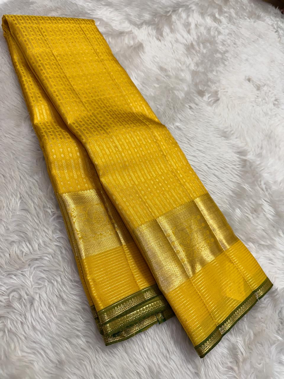 Full view of canary yellow handwoven Kanchipuram pure silk saree with zari kattam body — Idam Living