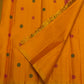 Close-up of crimson and green silk thread butta on mustard yellow Kanchipuram pure silk saree — Idam Living