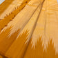 Spread Pure Kanchipuram Silk Saree with mustard body, beige panel, repeated temple motif pattern, and tasseled edge