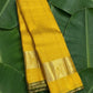 Canary yellow handwoven Kanchipuram pure silk saree with dense zari kattam body and forest green korvai border — Idam Living