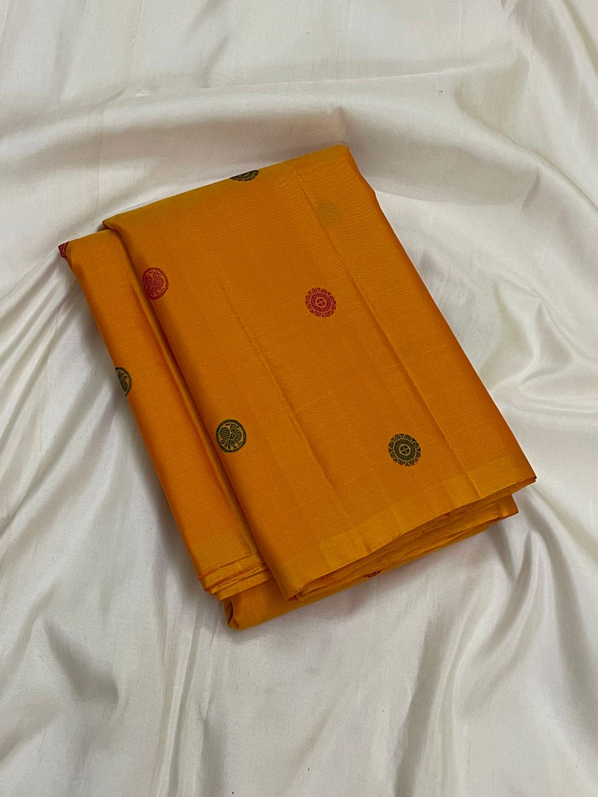 Full spread of mustard yellow Kanjeevaram silk saree with multi-colour silk thread butta — Idam Living