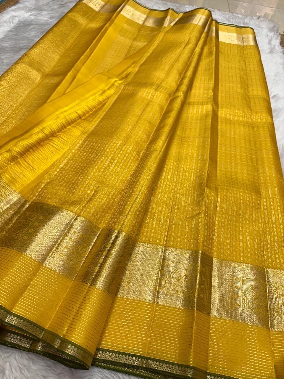 Wide plain gold zari border panel on canary yellow Kanchipuram pure silk saree — Idam Living