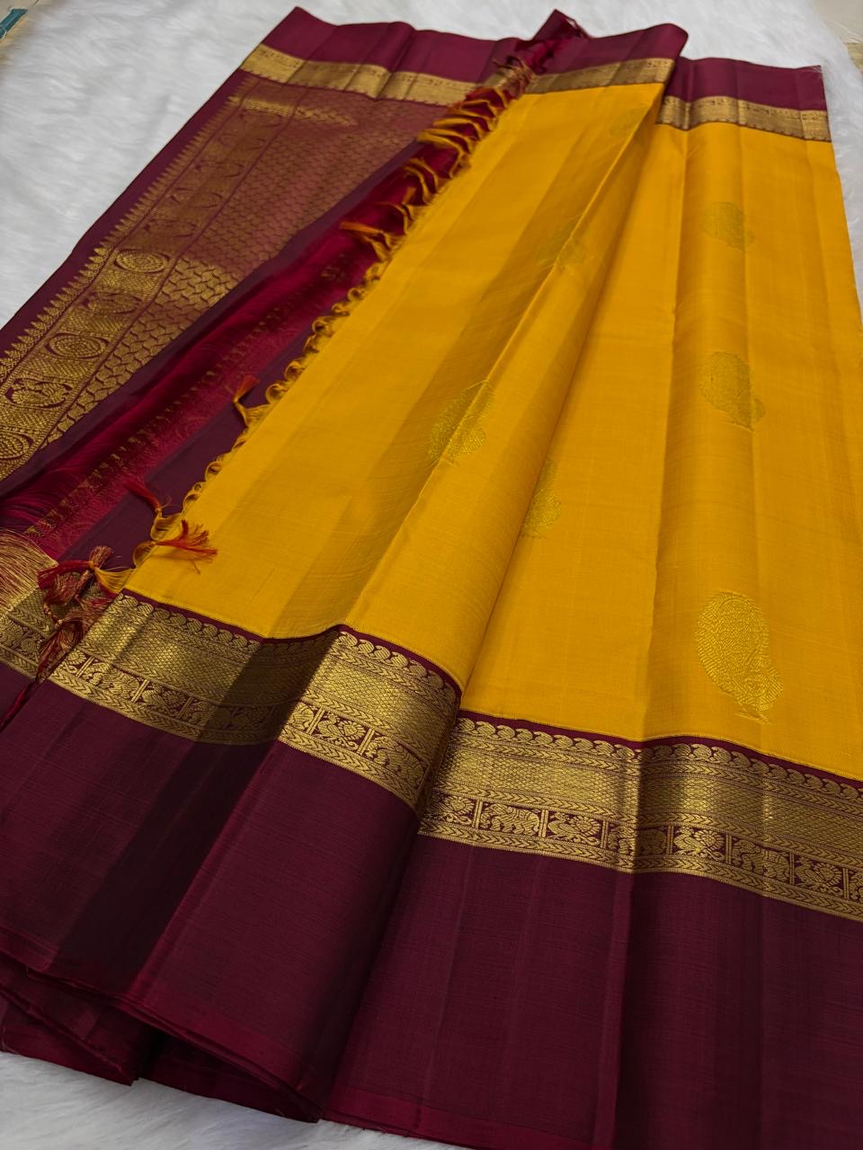 Mustard Yellow pure silk Kanchipuram saree — butta