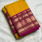 Mustard Yellow Handwoven Pure Silk Kanchipuram Saree with Pink Varisaipet Border