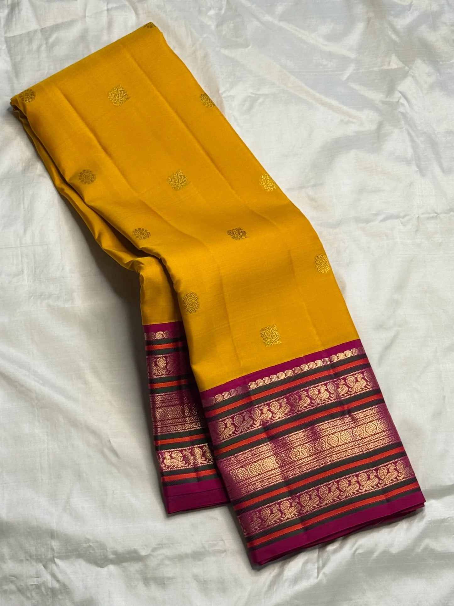 Mustard Yellow Handwoven Pure Silk Kanchipuram Saree with Pink Varisaipet Border
