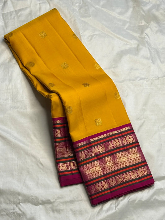 Mustard Yellow Handwoven Pure Silk Kanchipuram Saree with Pink Varisaipet Border
