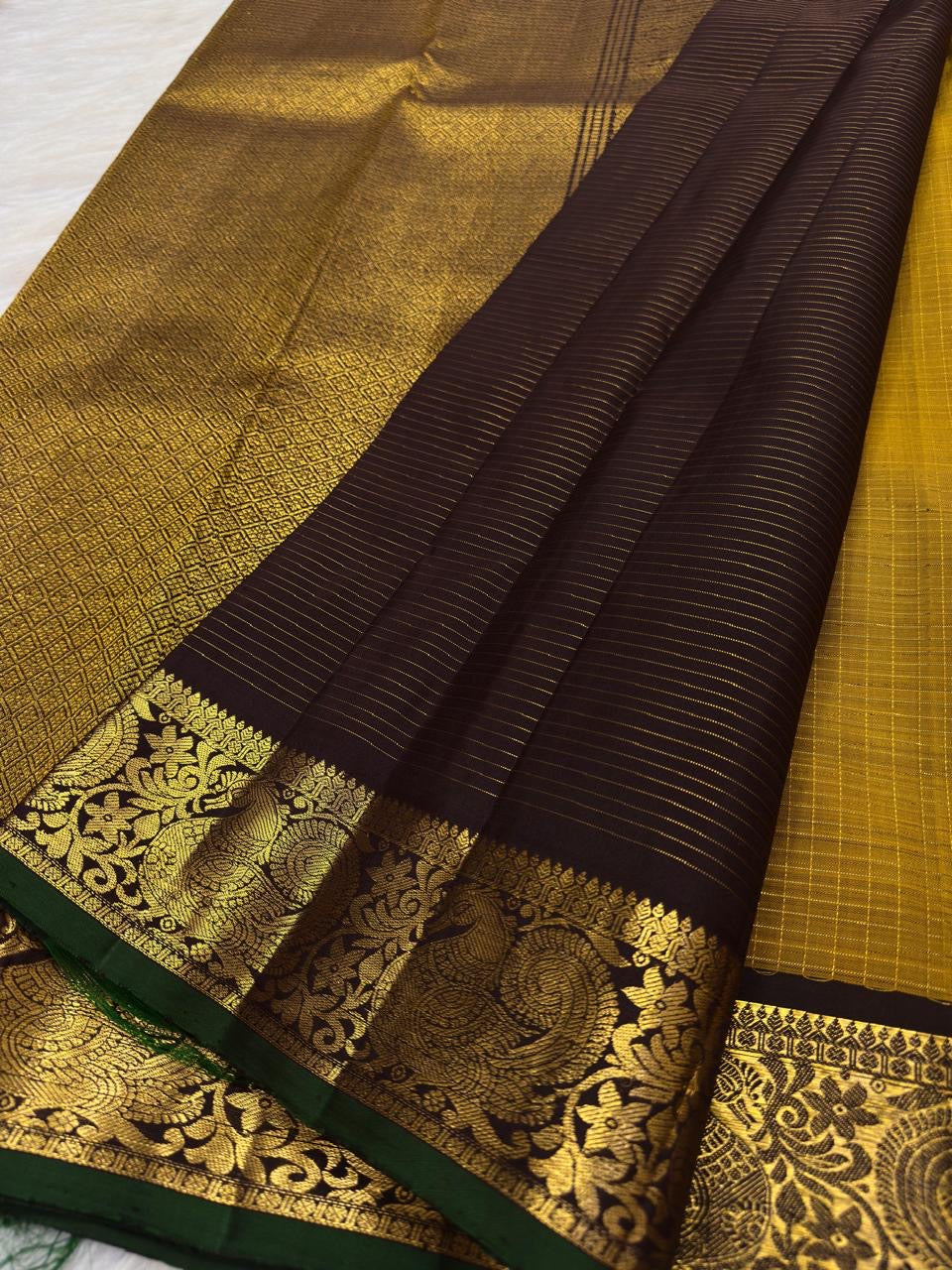 Mustard Yellow Handwoven Pure Silk Kanjivaram Zari Kattam Saree with Coffee Brown Peacock Border – silk body weave close-up
