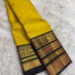 Black Varisaipet border with elephant procession and floral zari bands in antique gold