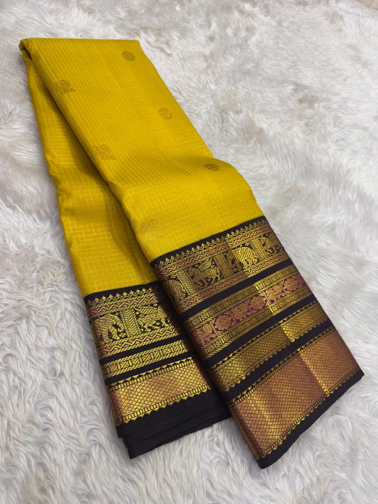 Black Varisaipet border with elephant procession and floral zari bands in antique gold