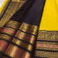 Black pallu with array of elephant, floral medallion, and chevron zari motifs cascading across full width
