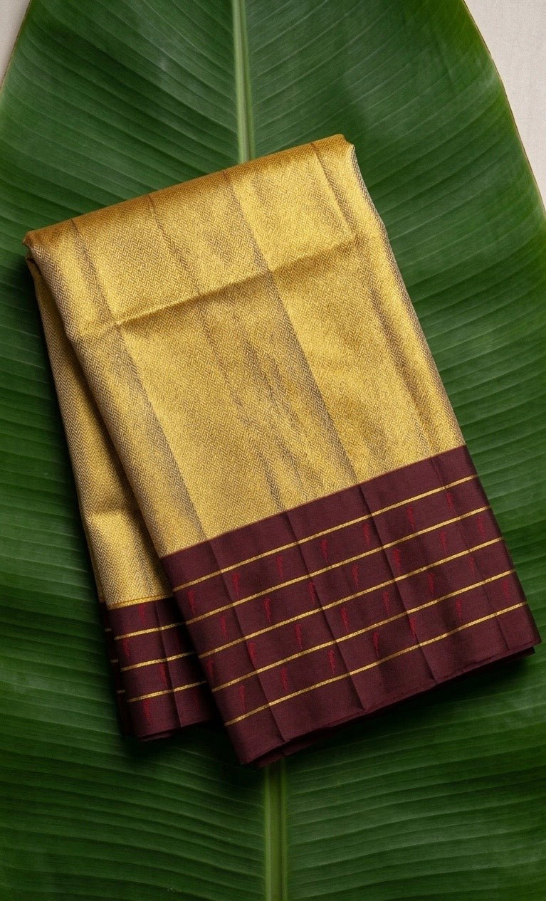 Muted Gold and Deep Plum Handwoven Pure Silk Kanchipattu Saree with Korvai Border
