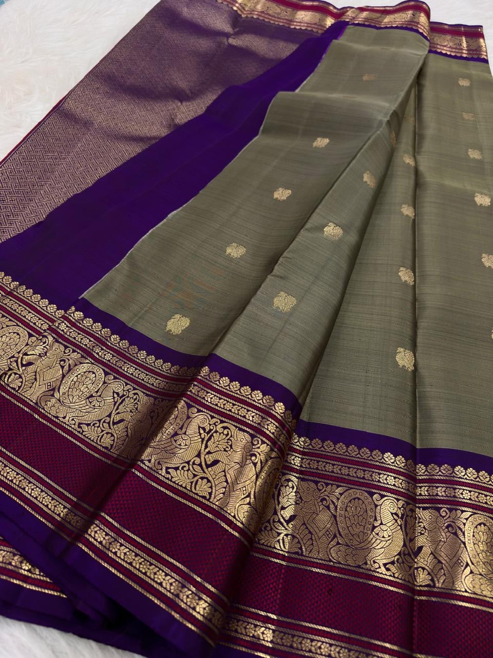 Muted Olive Green Pure Silk Kanjivaram Butta saree with Royal Purple zari border