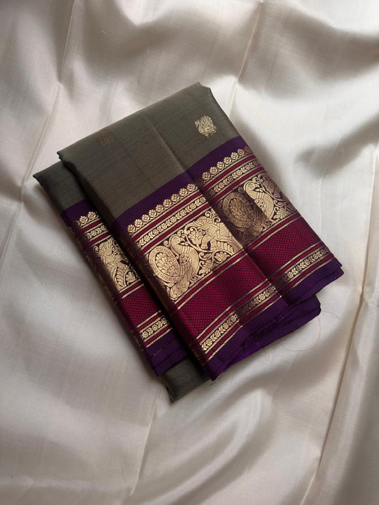 Olive Green Kanjivaram saree with ornate Royal Purple Mayil motif border