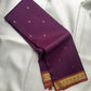 Muted Plum Purple handwoven pure silk Kanjivaram Butta saree with antique-gold paisley buttas.