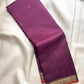 Muted Vadamalli Purple handwoven pure silk Kanjivaram Butta saree with antique-gold leaf buttas.