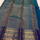 Peacock Blue Thazampoo Reku pure silk Kanchipuram saree, border zari, showing deep oceanic peacock blue with a teal-green glimmer, royal blue border accents and antique-gold zari