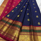 Close view of navy blue Kancheepuram silk body with ornate gold zari Yaanai Ambari elephant procession Butta