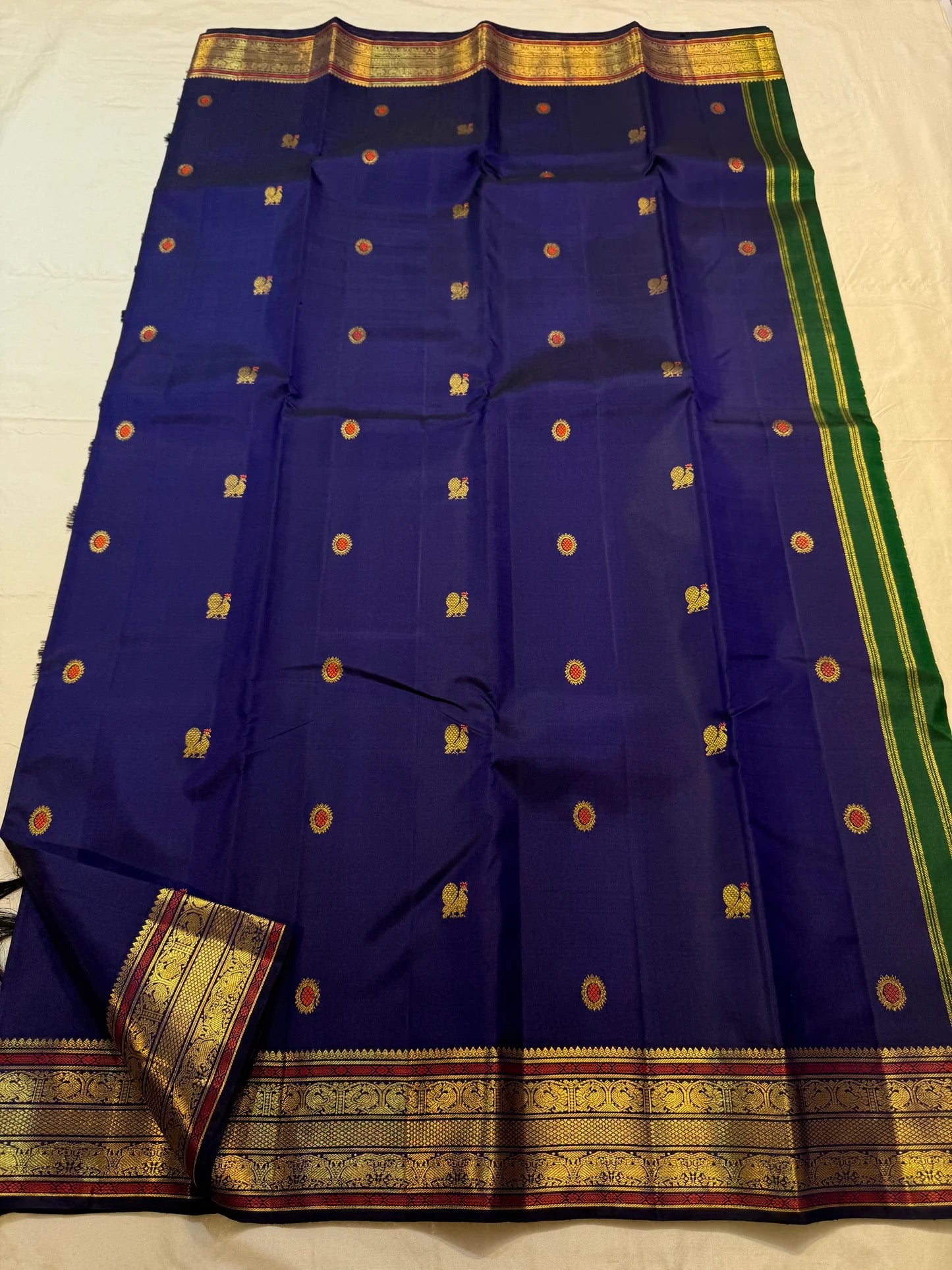 Bottle green korvai pallu with copper zari tanpura motifs on midnight navy Kanchipuram saree — Idam Living