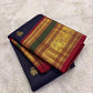 Deep red Vanasringaram gold zari border of navy blue Kancheepuram pure silk saree with elephant procession motif