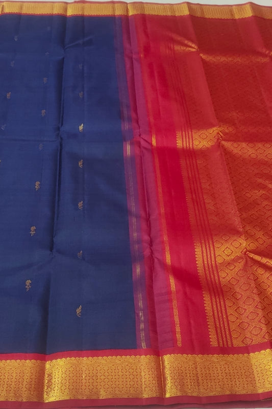 Vermilion red Korvai border on navy blue Kanjivaram silk saree
