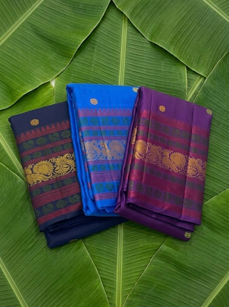 Close-up of kamalam butta in gold zari on navy blue Kancheepuram double warp pure silk saree — Idam Living