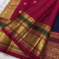 Detail of ornate gold zari Yaanai Ambari elephant procession Butta woven across navy blue Kancheepuram silk body