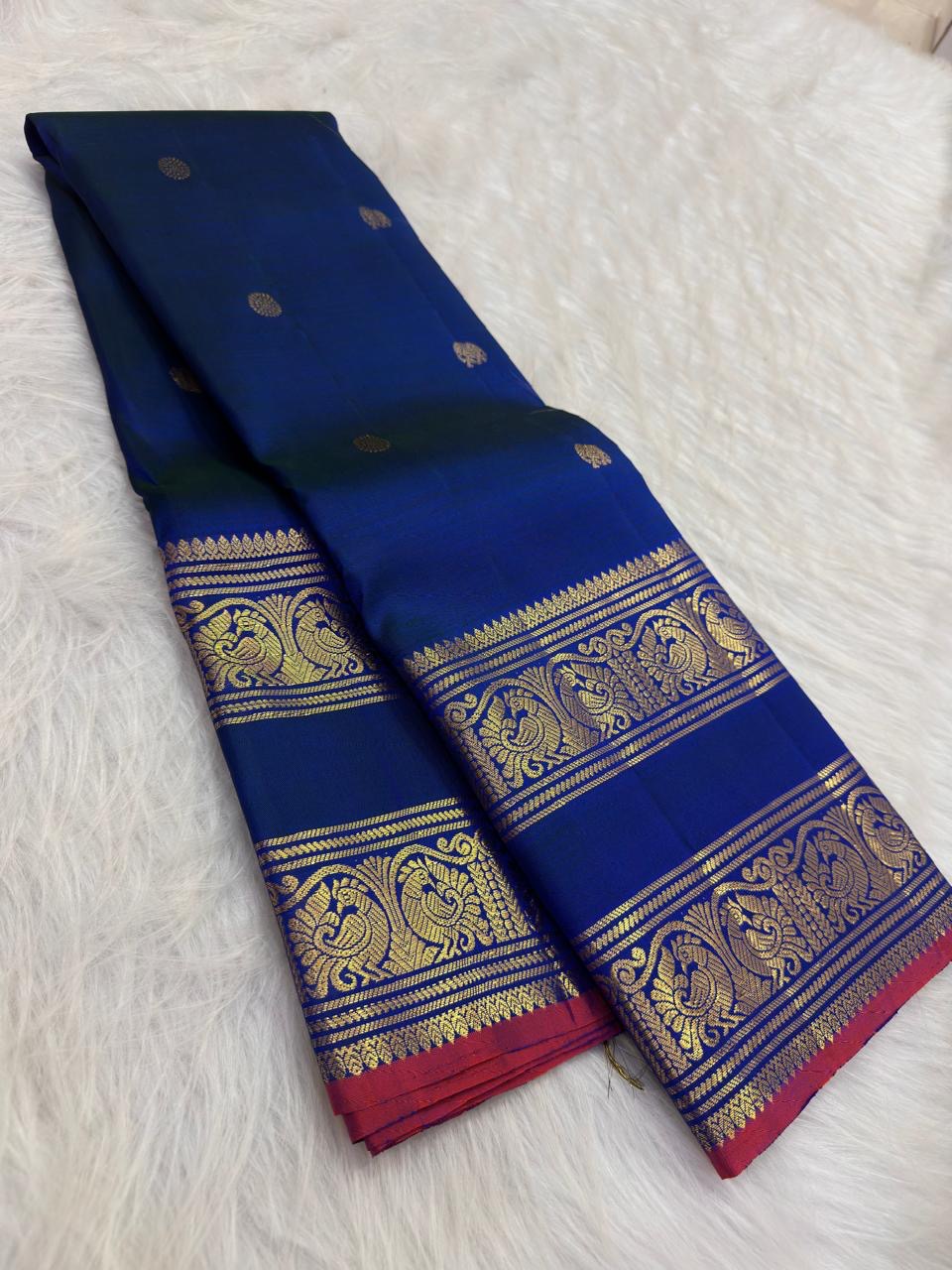 Deep Navy Blue Handwoven Pure Silk Kanchipuram Saree with Rettapet Mayil Zari Border and Orange-Red Selvedge