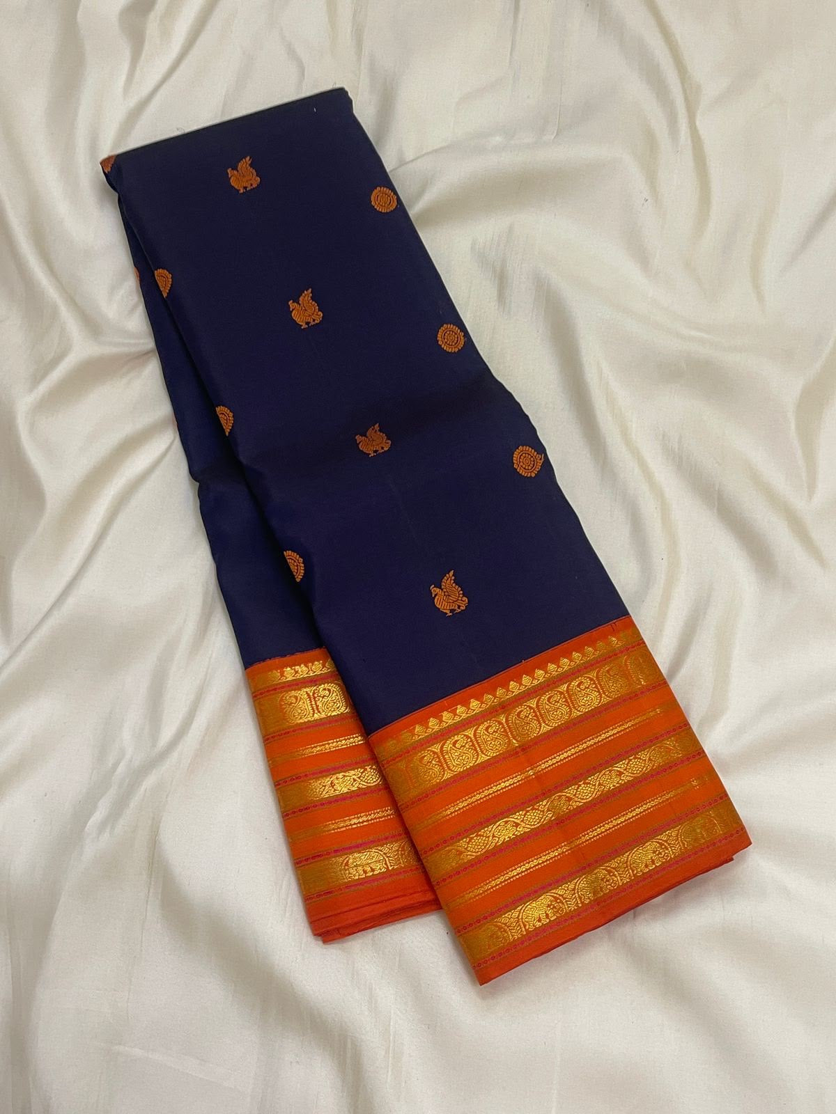 Navy Blue Kanjivaram body with traditional handwoven gold zari butta motifs