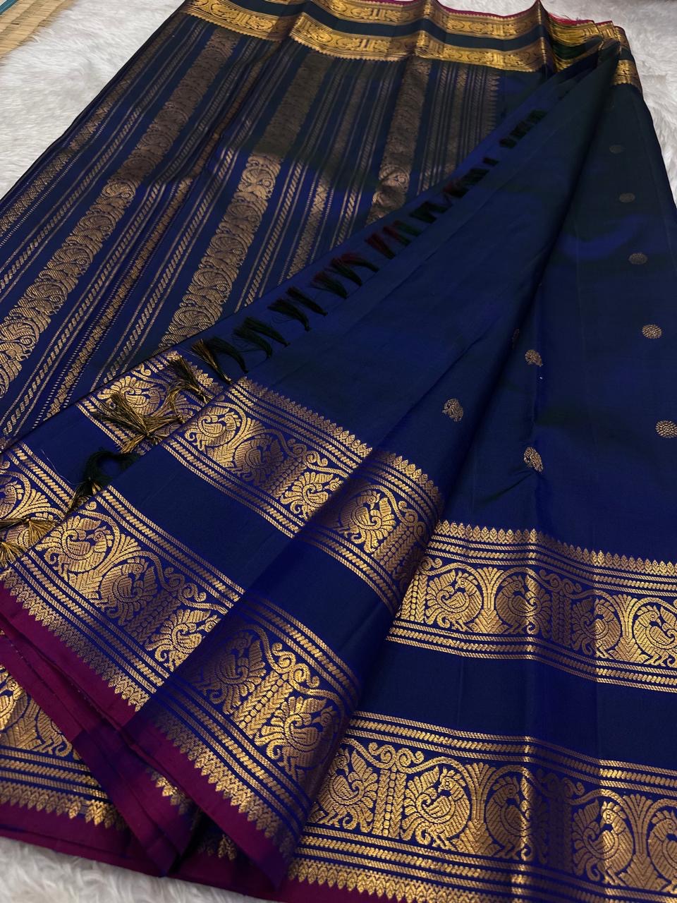 Navy blue and magenta handwoven pure silk Kanjipuram saree with Rettapet weave Mayil Pavun butta and Korvai antique gold zari border overview