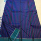 Navy handwoven pure silk Kanchi Pattu saree with teal jewel-tone butta work — Idam Living