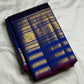 Close-up of maanga butta in gold zari on amethyst purple navy Kancheepuram silk saree — Idam Living