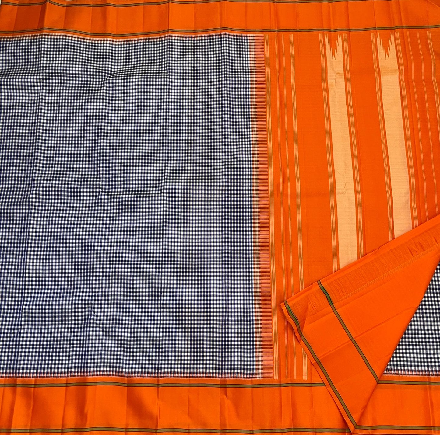 Handwoven pure silk Kancheepuram saree with navy white Kanchi Kattam check body and orange Pillayar Reku Korvai border Silk Mark certified