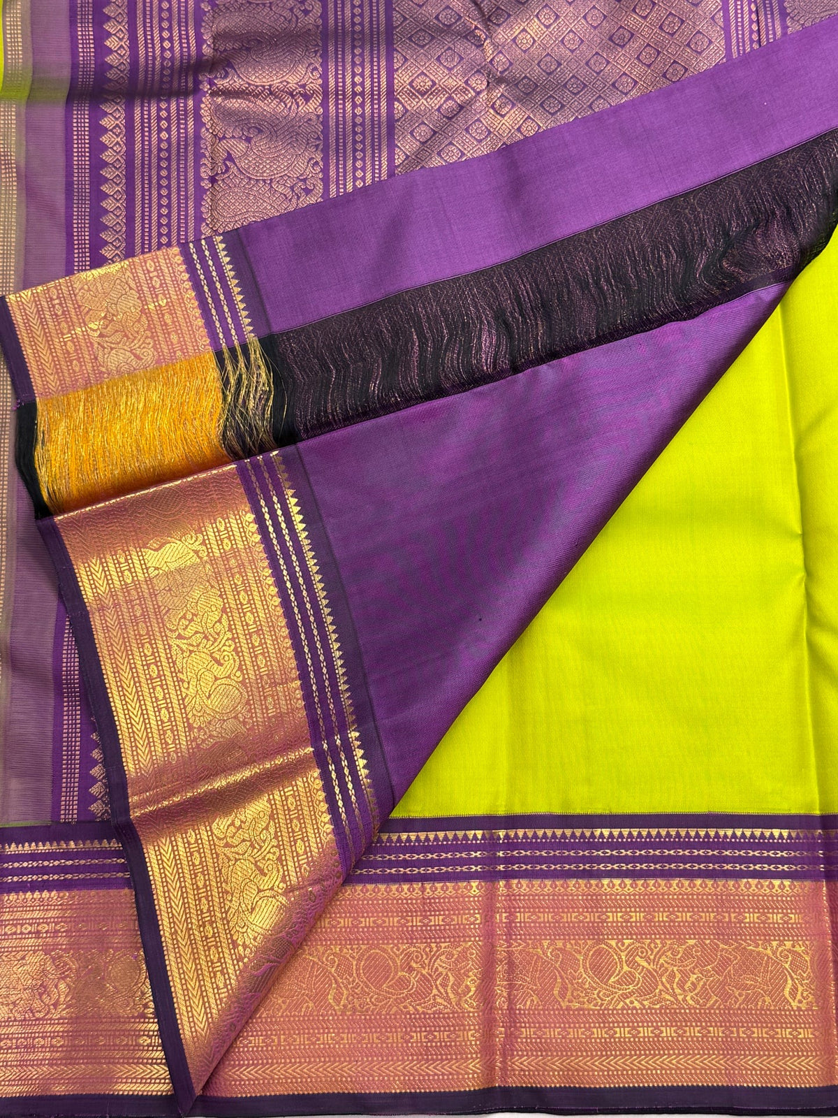 Navy purple Kanchipuram border with gold zari elephant and peacock motifs