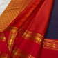 Pallu detail of deep navy Vairaoosi KanchiPattu silk saree with vermilion red zari border