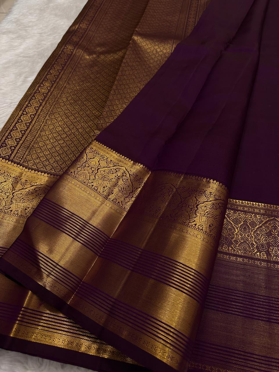 Needle-fine Vairaoosi-style zari lines on the Kathiri Purple silk.