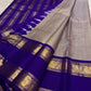 Neelam blue silk body detail showing repeated vertical zari lines.