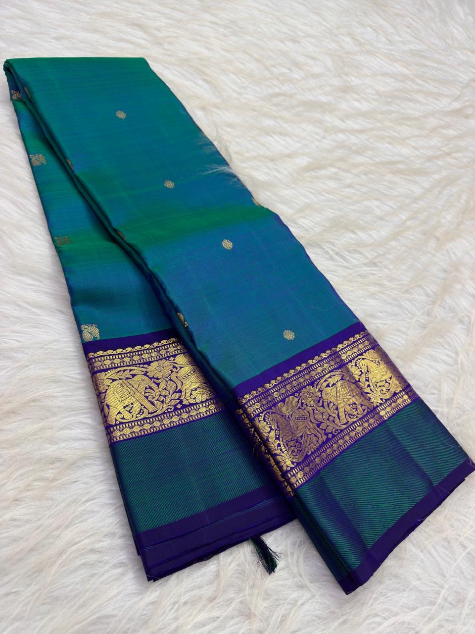 Neelam Blue Handwoven Pure Silk Kanchipuram Butta Saree with Teal Green Bird Motif Kaal Irangiya Gold Zari Border