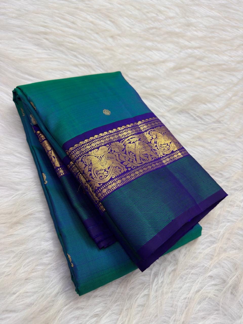 Neelam Blue Handwoven Pure Silk Kanchipuram Butta Saree with Teal Green Bird Motif Kaal Irangiya Gold Zari Border