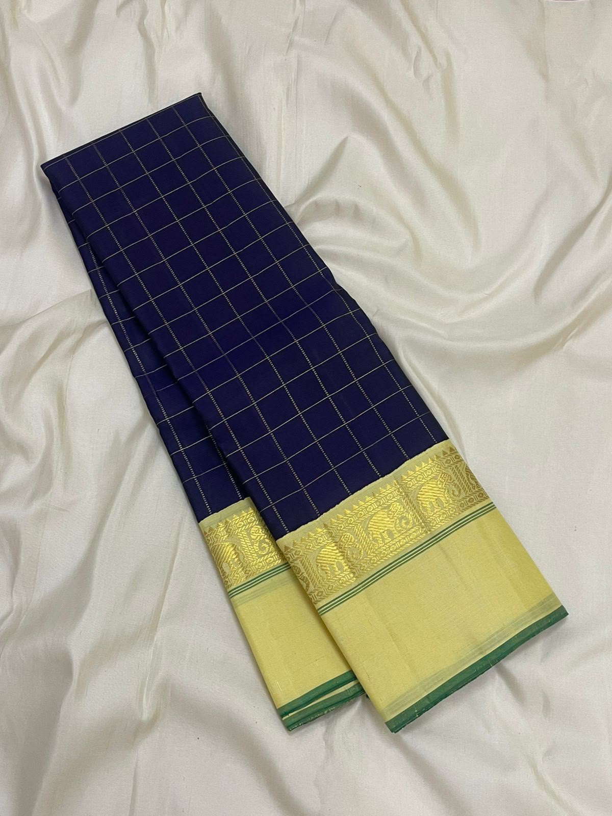 Neelam Blue Handwoven Pure Silk KanchiPattu Kanchi Kattam Saree with Kaal Irangiya Ivory Gold Border