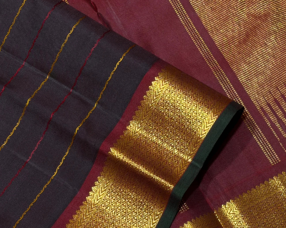 Close view of the body weave on the Coffee Brown Handwoven Pure 2G Jari Kanjivaram Saree with Neli Veldhari Body and Maroonish Brown Borders.