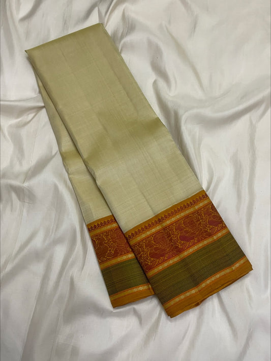 No-zari silk thread border detail on the warm ivory Pattupet Kanchipuram saree